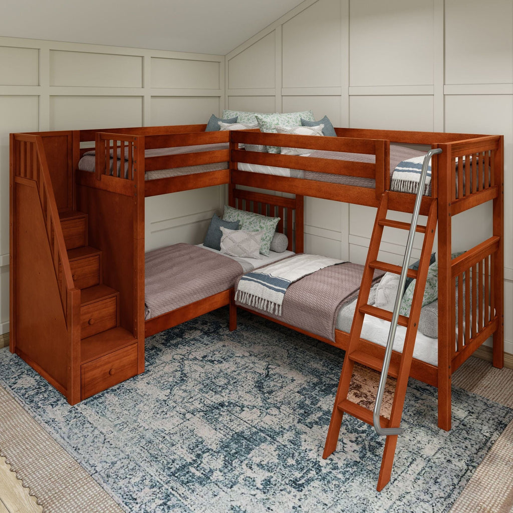Wooden bunk bed with built-in storage stairs and metal ladder, twin-over-twin beds with neutral quilts and floral pillows in kids' bedroom with paneled wall and area rug
