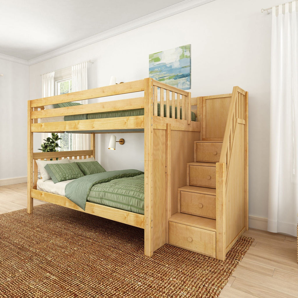 Solid wood bunk bed with built-in storage stairs, green quilted bedding and natural finish in a bright kids' bedroom