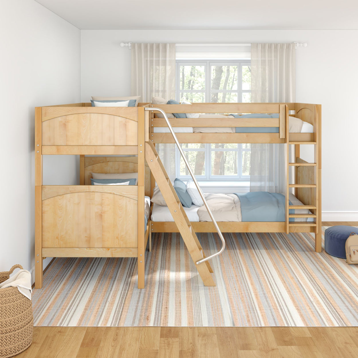 Natural wood bunk beds with ladder and blue bedding in a bright kids bedroom with large window, sheer curtains, and striped rug