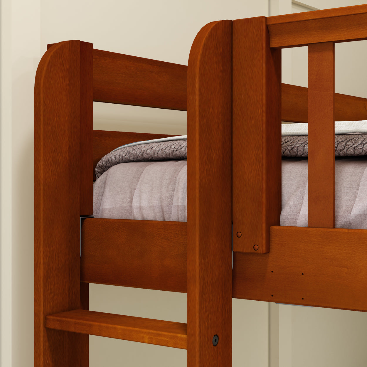 Wooden bunk bed with cozy mattress in a modern bedroom setting.