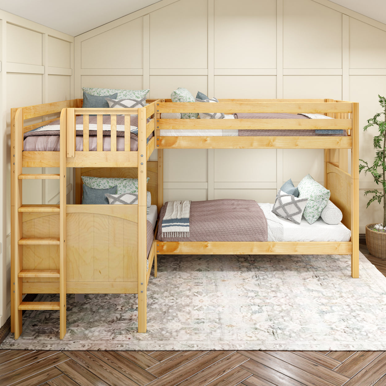 Wooden L-shaped bunk bed with cozy bedding and decorative pillows in a modern bedroom setting.