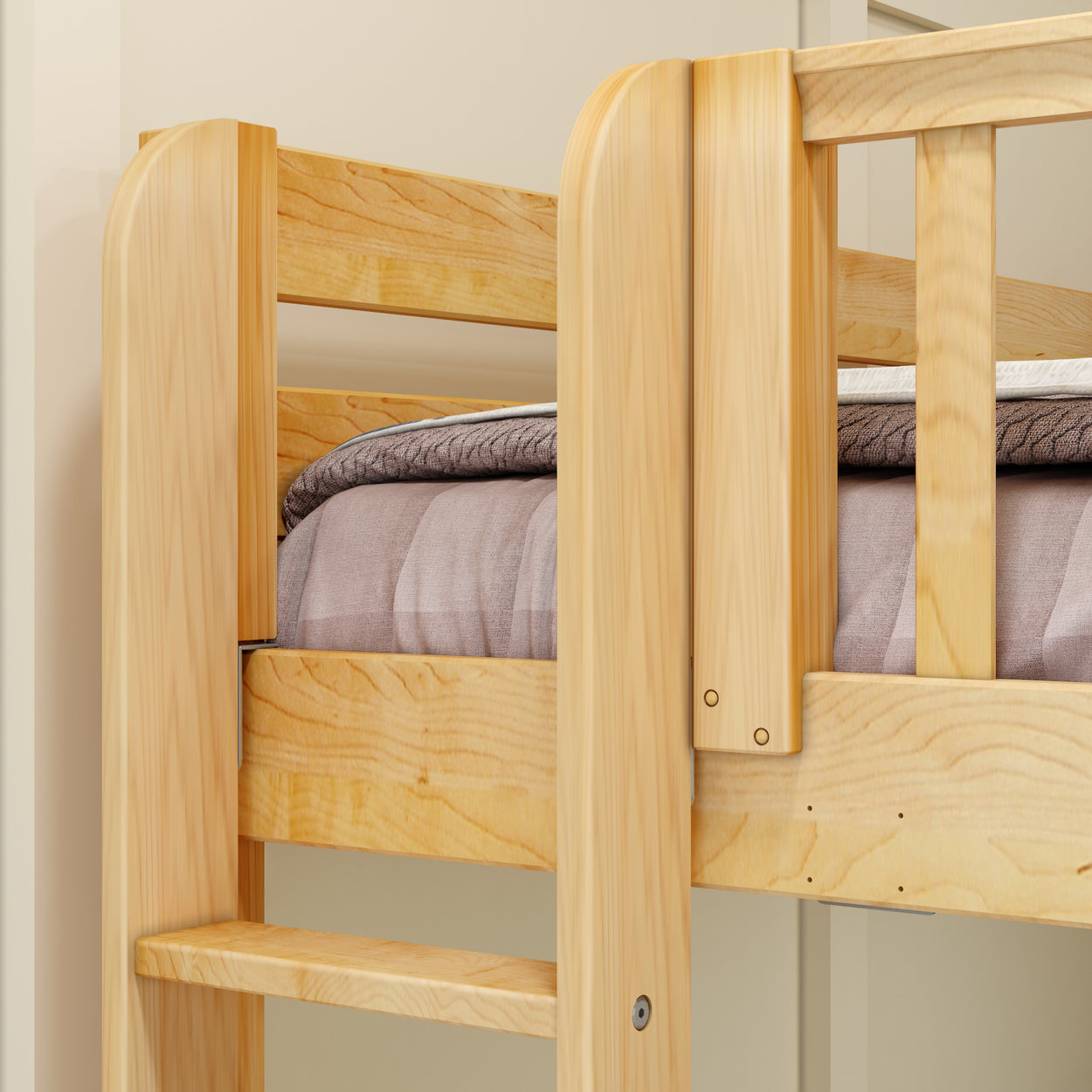 Close-up of a wooden bunk bed ladder and frame with a cozy brown blanket in a child's bedroom.