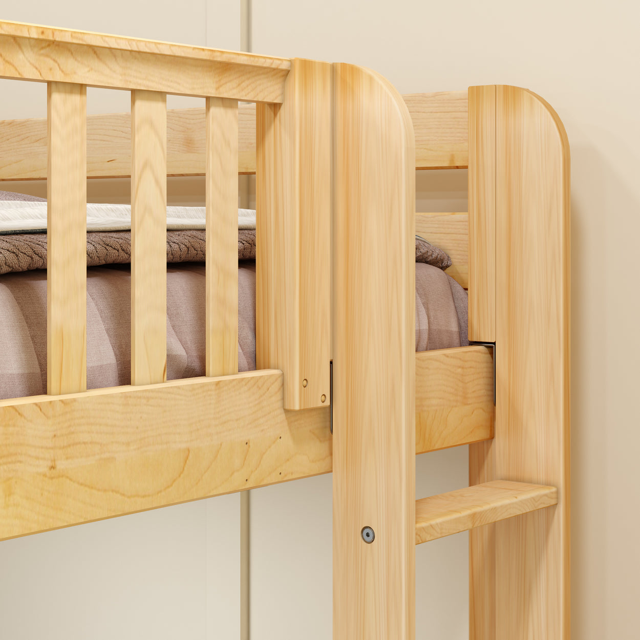 Wooden bunk bed with ladder and safety railings in a light pine finish.