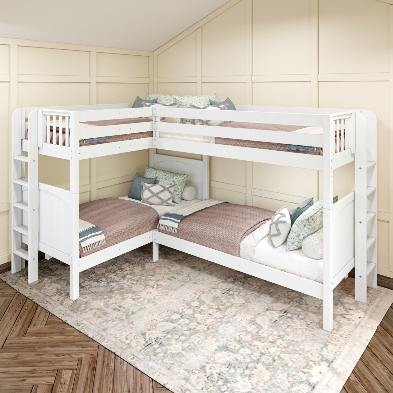 Stylish white L-shaped bunk bed set in a cozy room with wood-paneled walls and a plush area rug.