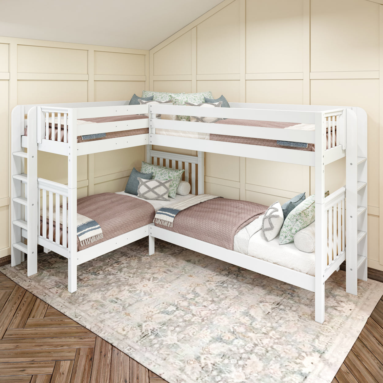 Modern white L-shaped bunk beds with cozy pillows and blankets in a stylish bedroom setting.