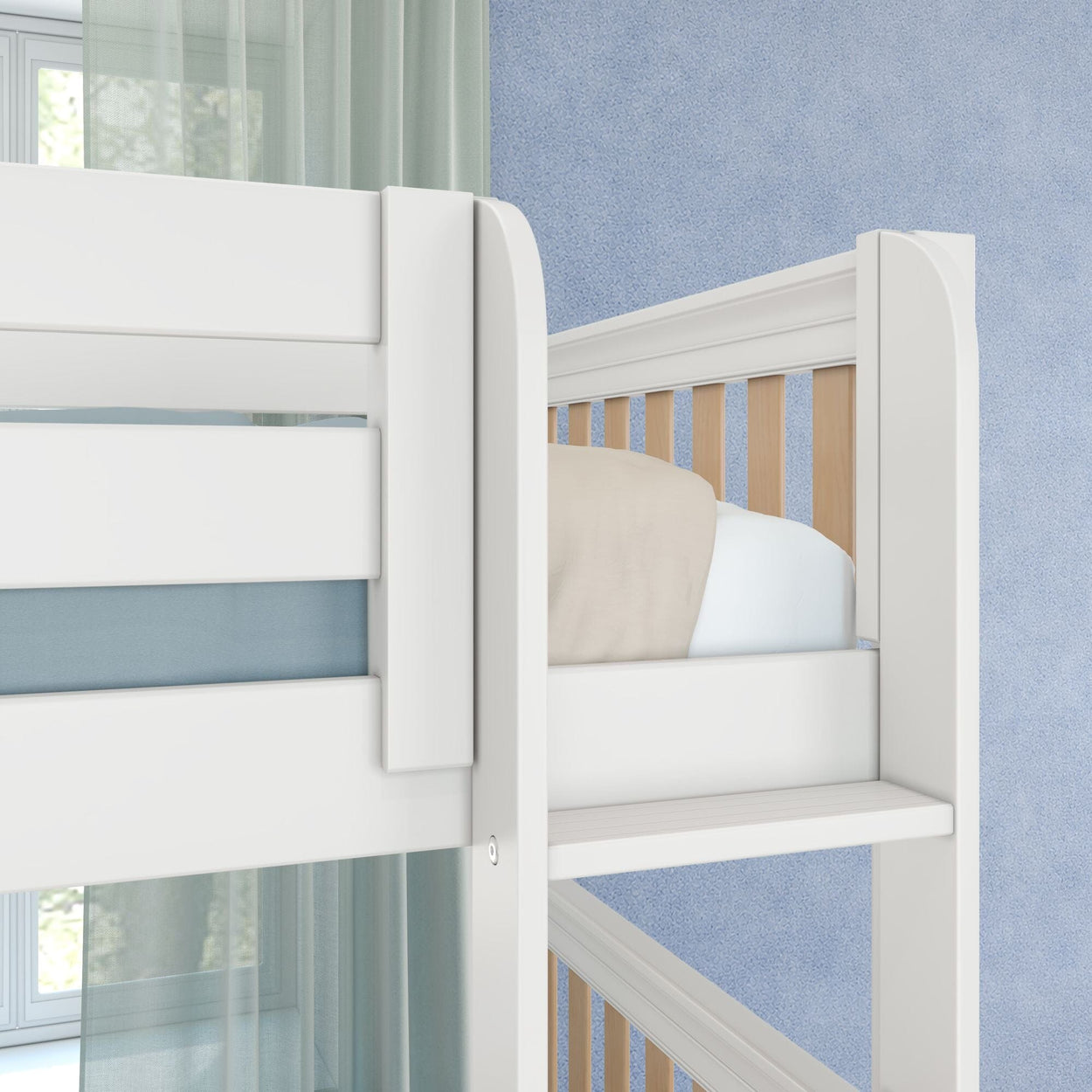 Close-up of white wooden bunk bed ladder and slatted rails in a modern children's bedroom with blue textured wall, sheer curtains and neutral bedding