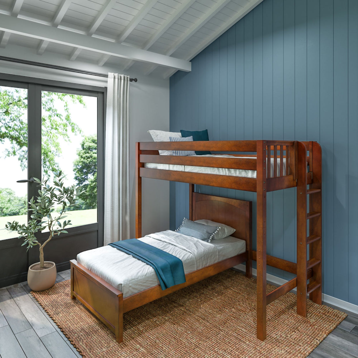 Elegant wooden bunk bed in a modern bedroom with blue accent wall and large window.