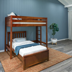 Stylish wooden bunk bed in a modern bedroom with blue walls, emphasizing space-saving and cozy interior design.