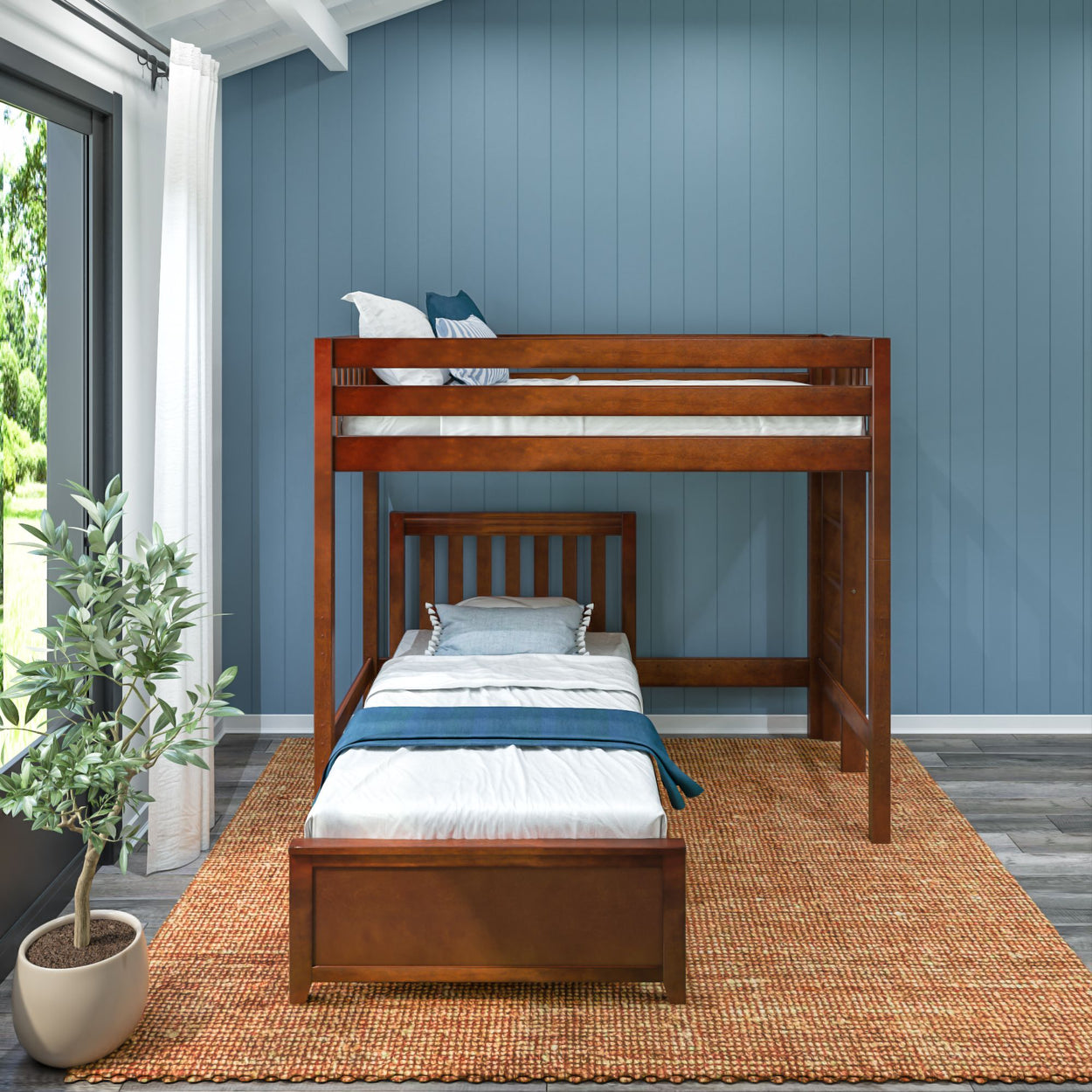 Stylish wooden bunk bed in modern bedroom with blue accent wall and natural light.