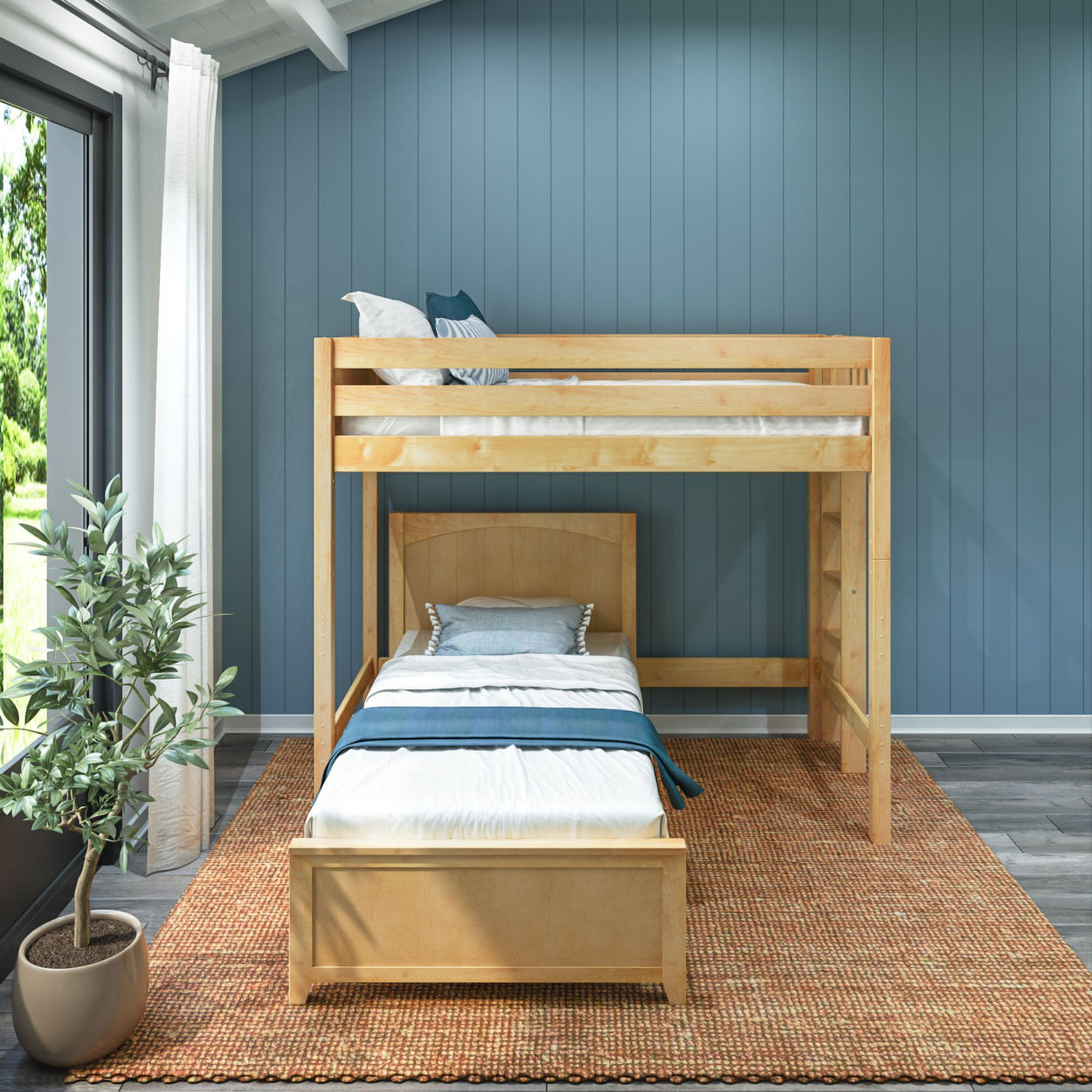Wooden bunk bed in a modern room with blue wall, featuring white and blue bedding and a potted plant for a cozy and stylish bedroom setup.