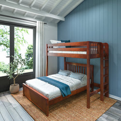 Stylish wooden bunk bed in a modern bedroom with blue walls and natural lighting.