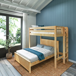 Wooden bunk bed in modern bedroom with blue accent wall and natural light.