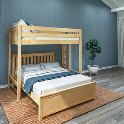Wooden bunk bed in a modern bedroom with a blue accent wall and cozy bedding.