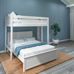 White bunk bed with lower double bed in modern blue bedroom with wooden floor and plant.