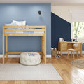 Kids bedroom with natural wood loft bed, blue accent wall, striped pillows, study desk, toys and light hardwood floors