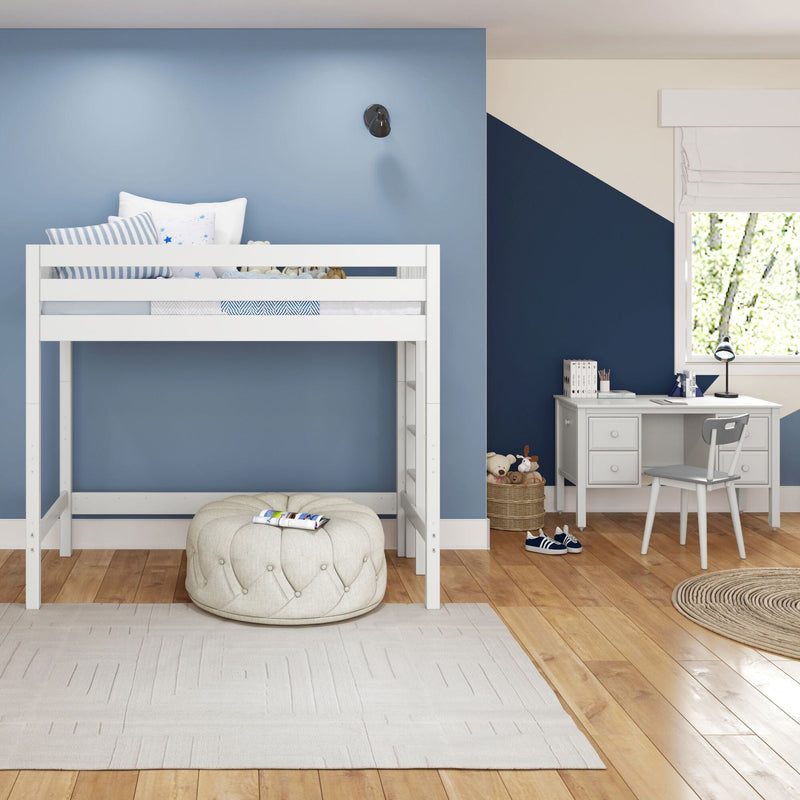 Children's bedroom with white loft bunk bed, blue and navy geometric accent walls, study desk, toy basket and hardwood floors