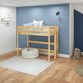 Modern children's loft bed with natural wood frame against a blue accent wall, striped and star pillows, stuffed animals, pouf, rug and hardwood floors