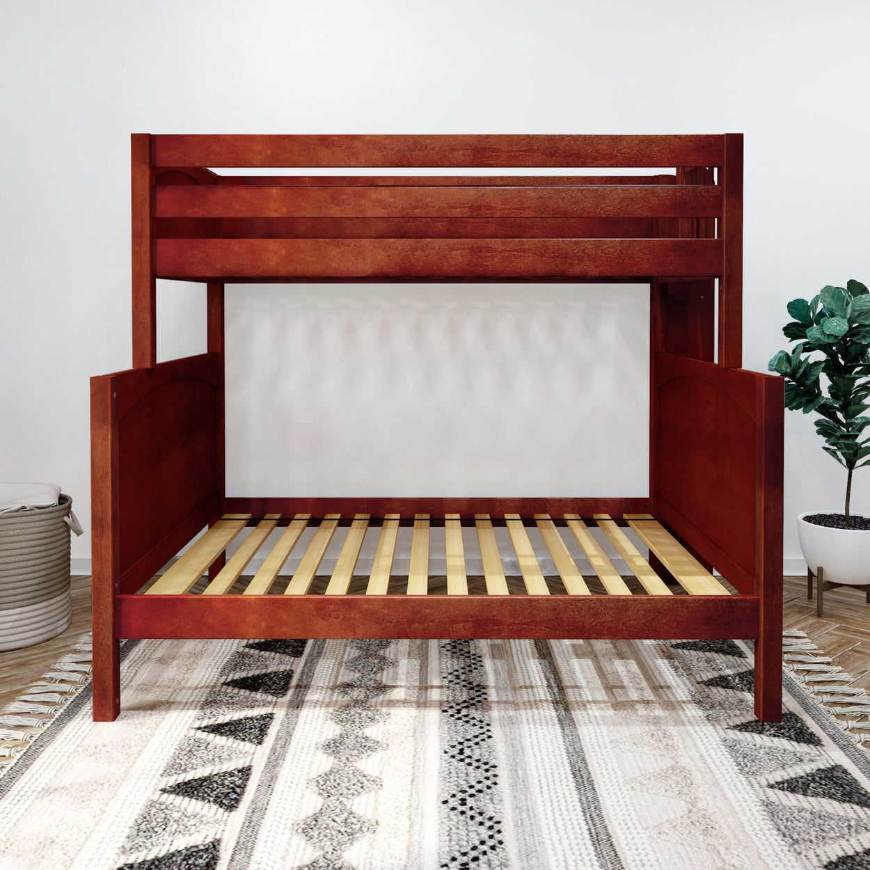 Wooden bunk bed frame on a patterned rug in a modern bedroom setting.