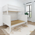 White wooden twin-over-full bunk bed frame with slatted mattress support in bright modern kids' bedroom with black-framed window and patterned rug