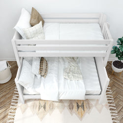 Modern children's white wooden bunk bed with cozy bedding and decorative pillows in a stylish bedroom.