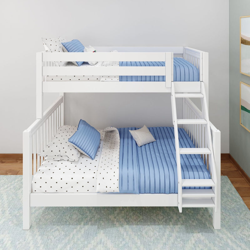 White wooden bunk bed with ladder, blue quilted bedding and star-pattern sheets in modern children's bedroom, space-saving kids' loft design