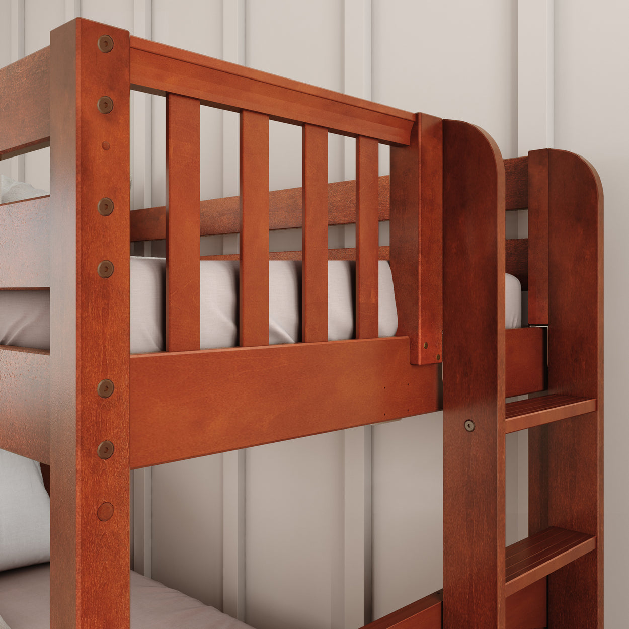 Wooden bunk bed with ladder in a well-lit room.