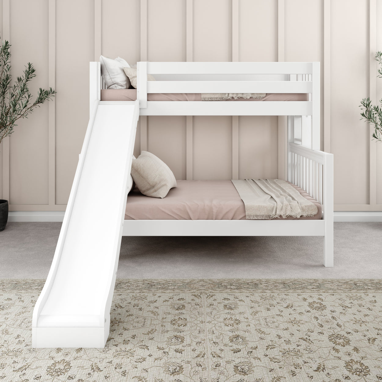 White bunk bed with slide in a modern kids' bedroom featuring beige decor and a patterned rug.