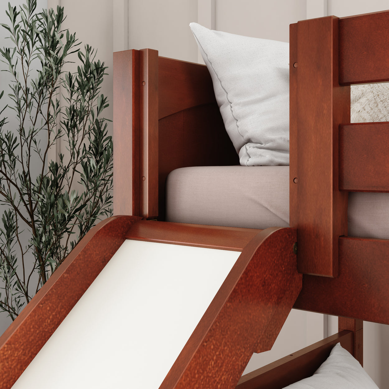 Luxury wooden bunk bed with slide and cushion for children's bedroom decor.