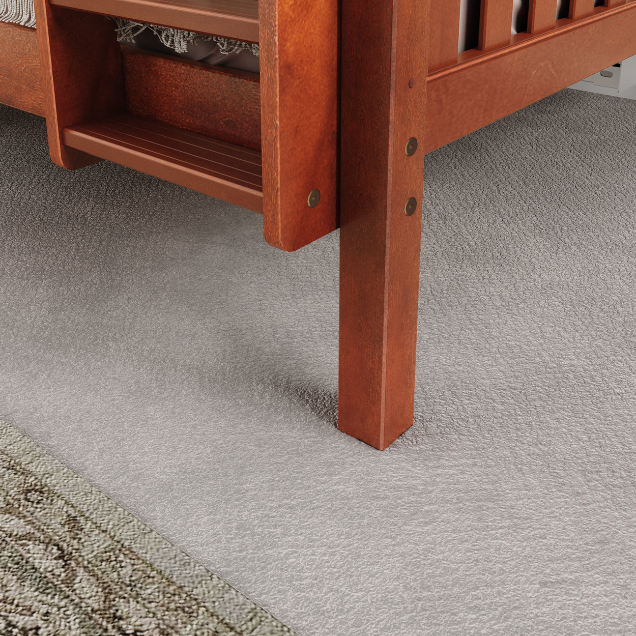 Wooden bunk bed ladder on beige carpet flooring in cozy bedroom.