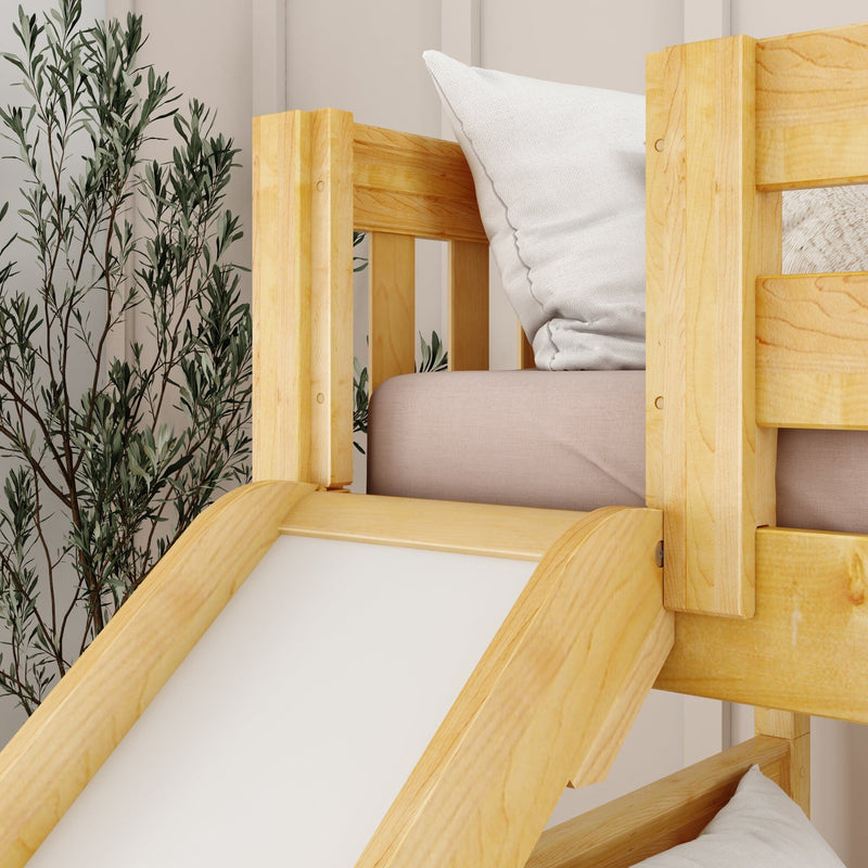 Wooden bunk bed with slide and pillows in a modern bedroom setting.