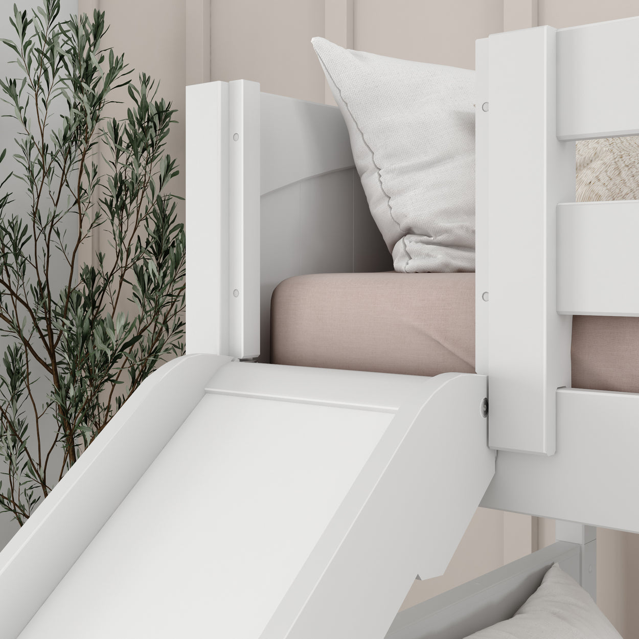 Modern Scandinavian style white bunk bed with slide and cozy pillows in a stylish kid's bedroom.