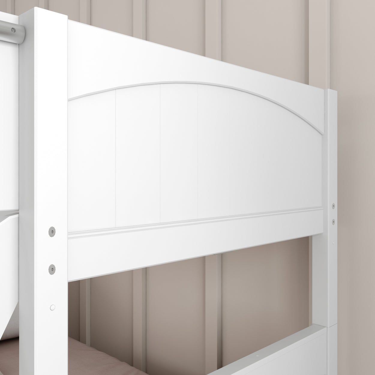 White wooden bunk bed headboard against beige wall background.