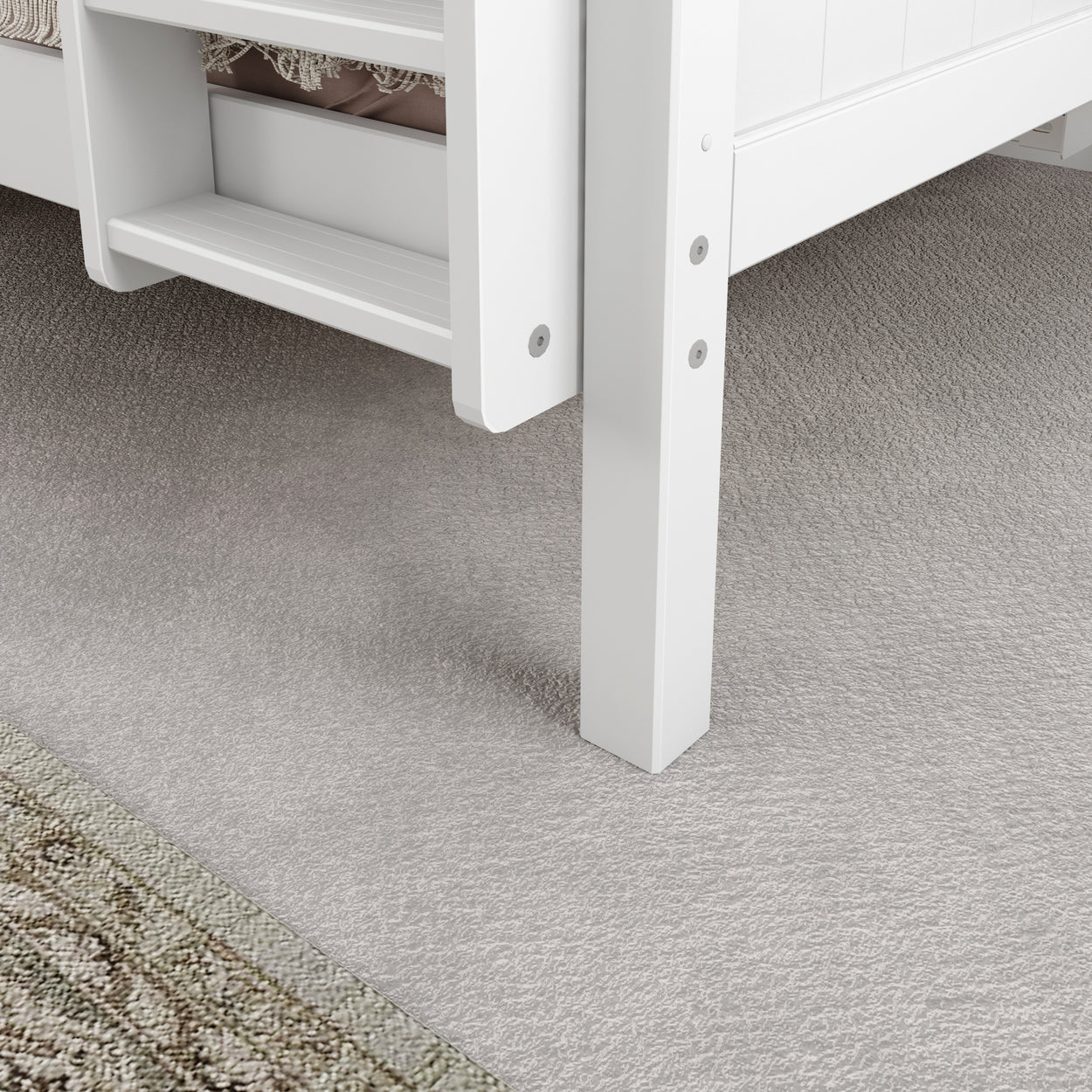 White wooden bunk bed frame on soft gray carpet flooring.