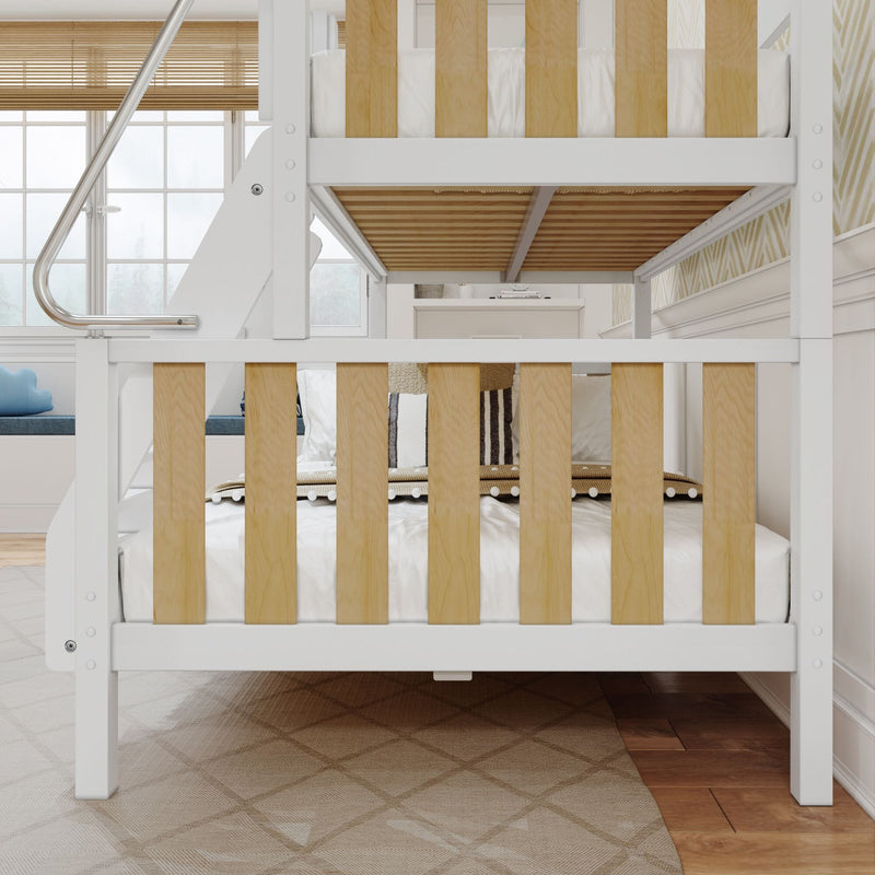 Modern white and natural wood bunk bed with slatted guardrails and ladder in a bright kids' bedroom with cozy bedding and window blinds