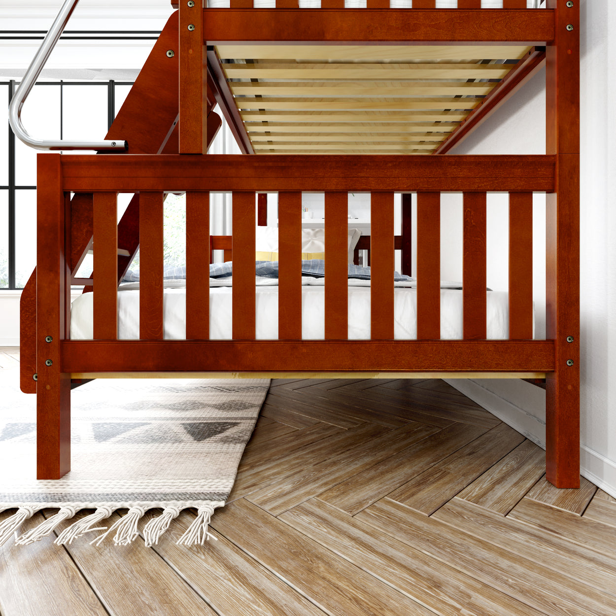 Wooden bunk bed with ladder in modern bedroom on herringbone wood floor.
