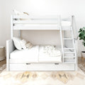 White wooden bunk bed with ladder and under-bed storage drawer, styled with neutral bedding, decorative pillows, geometric rug and potted plant in a modern kids' bedroom