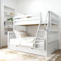 White wooden twin-over-full bunk bed with ladder and trundle in bright modern kids bedroom, neutral bedding, pillows and built-in shelves