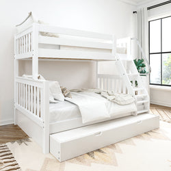 White wooden bunk bed with stair access and pull-out trundle drawer in a bright, minimalist bedroom.
