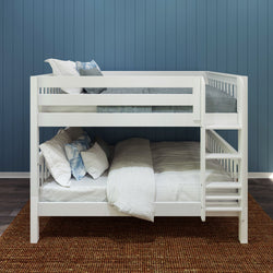 Stylish white bunk bed with comfortable bedding in a modern bedroom with blue paneled walls.