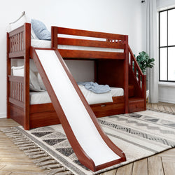 Wooden bunk bed with slide in a stylish kids' bedroom featuring natural light and cozy decor.
