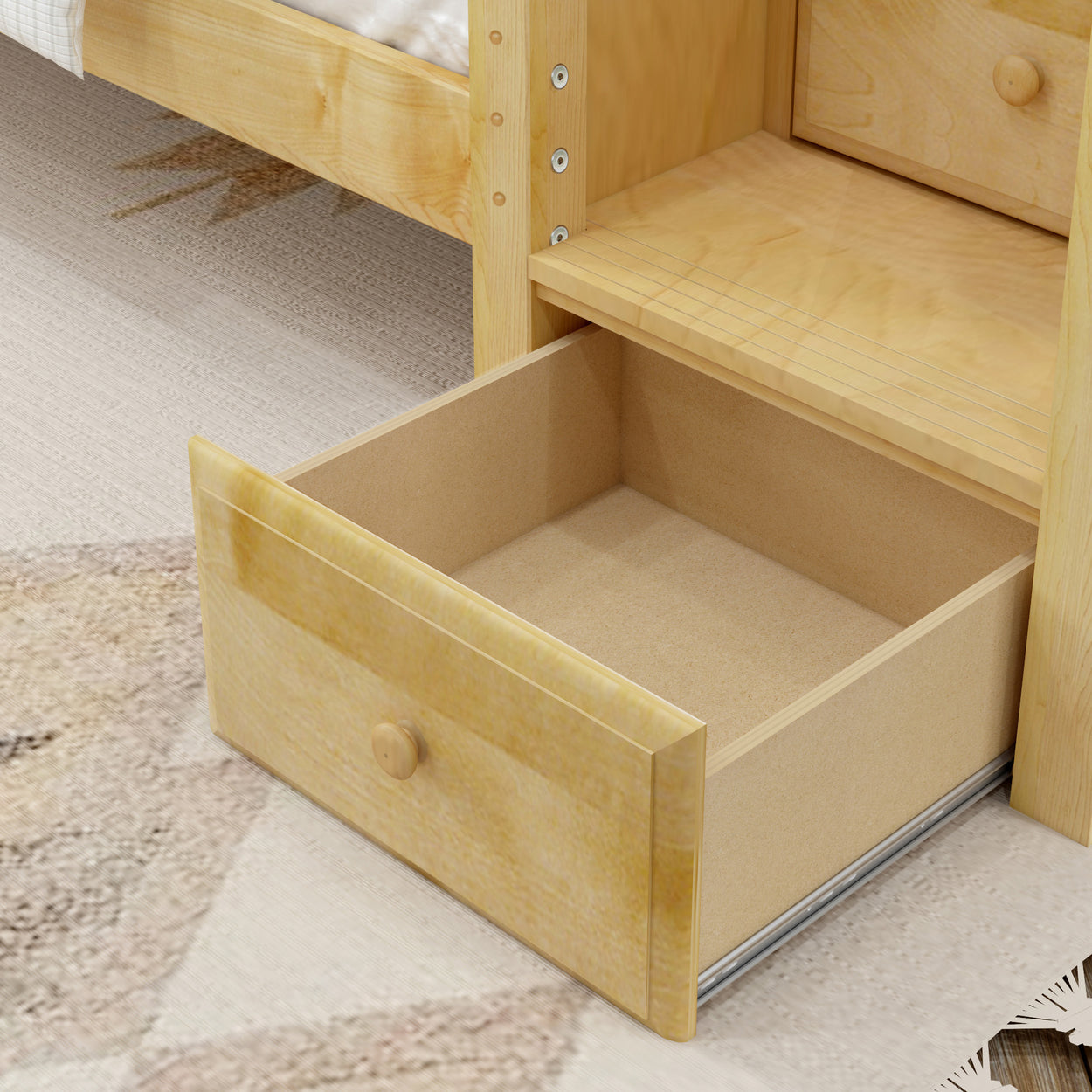 Open wooden drawer under bed in a modern bedroom setting.