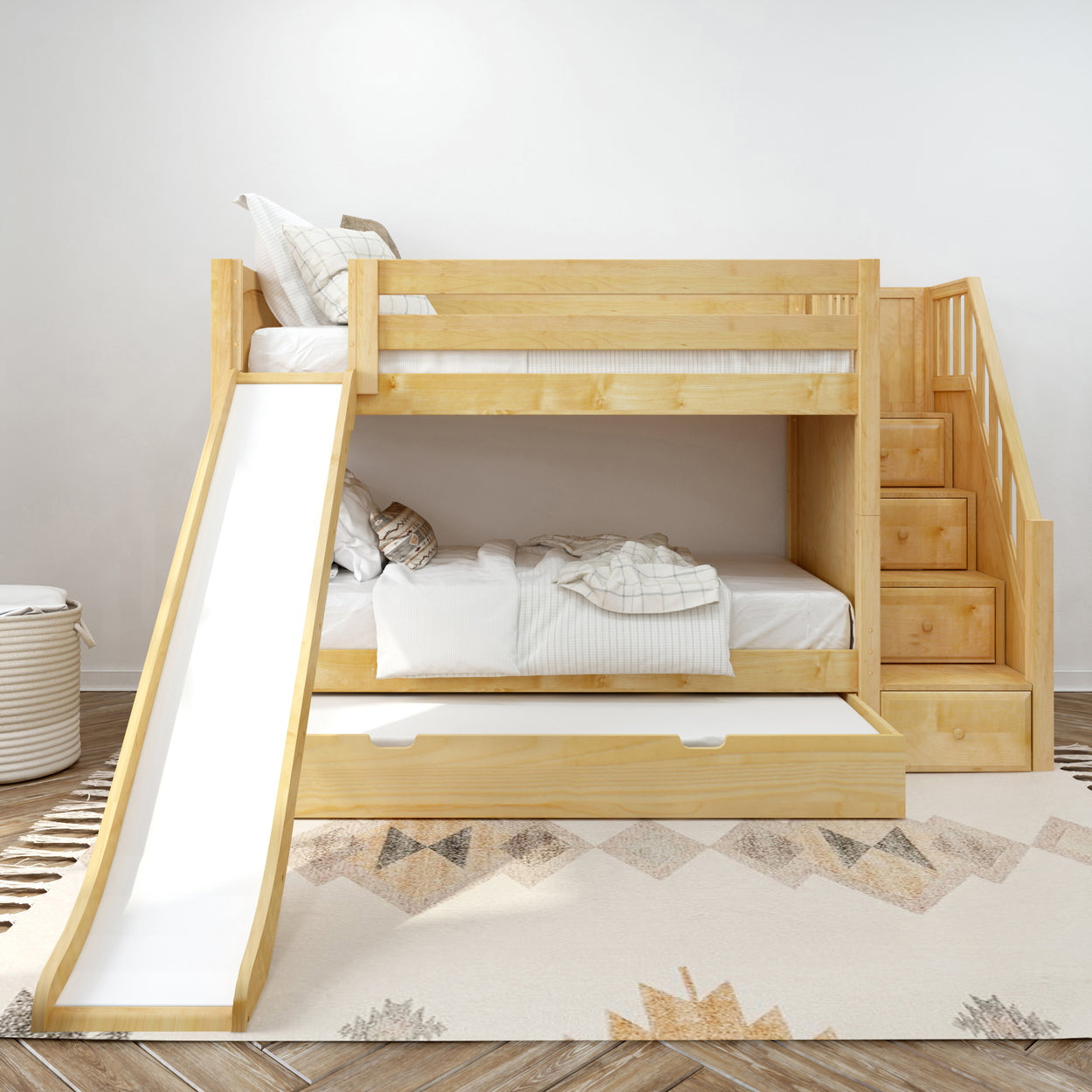 Wooden bunk bed with slide, storage drawers, and staircase in a modern kids' room.