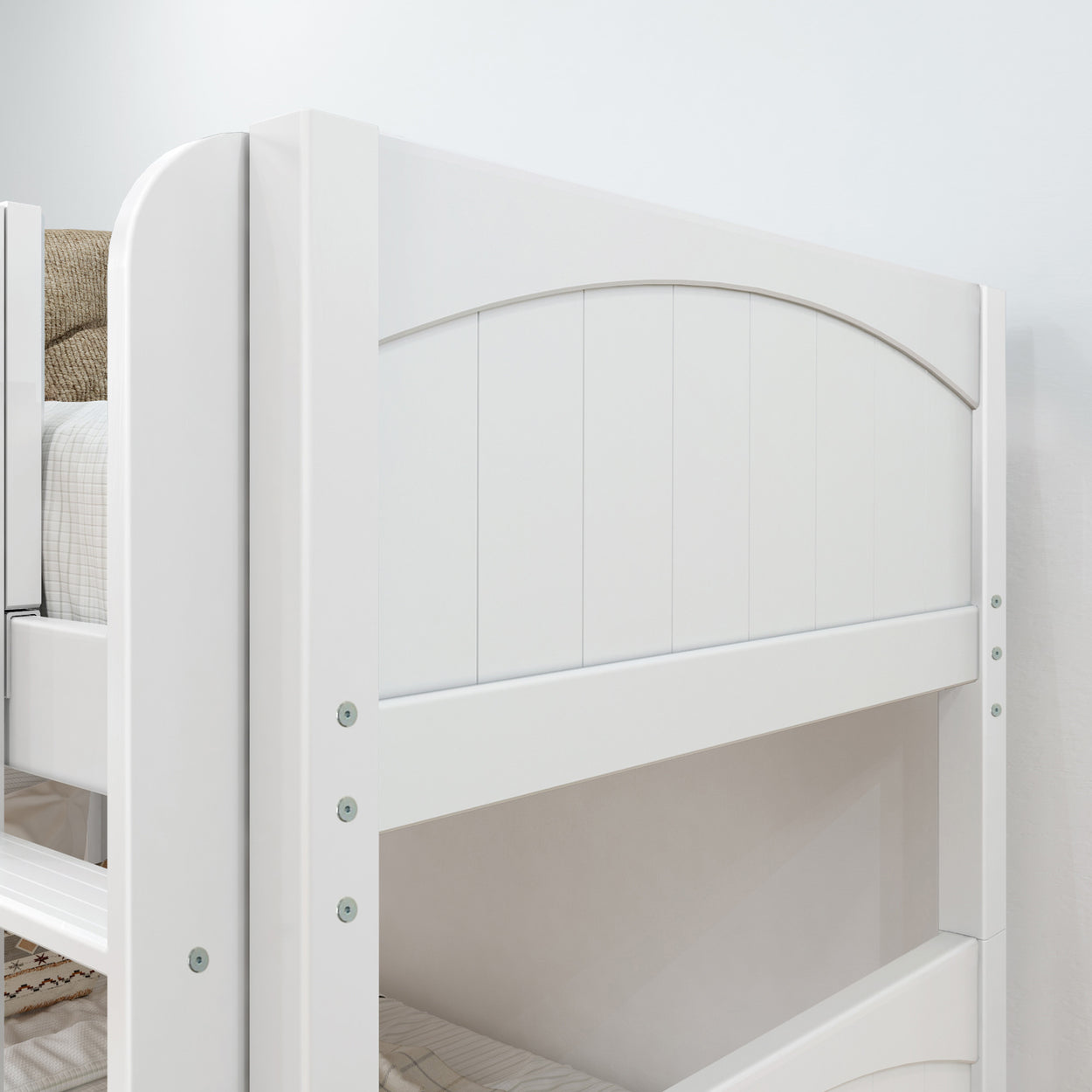 White wooden bunk bed close-up with panel detailing, ideal for modern bedroom furniture.