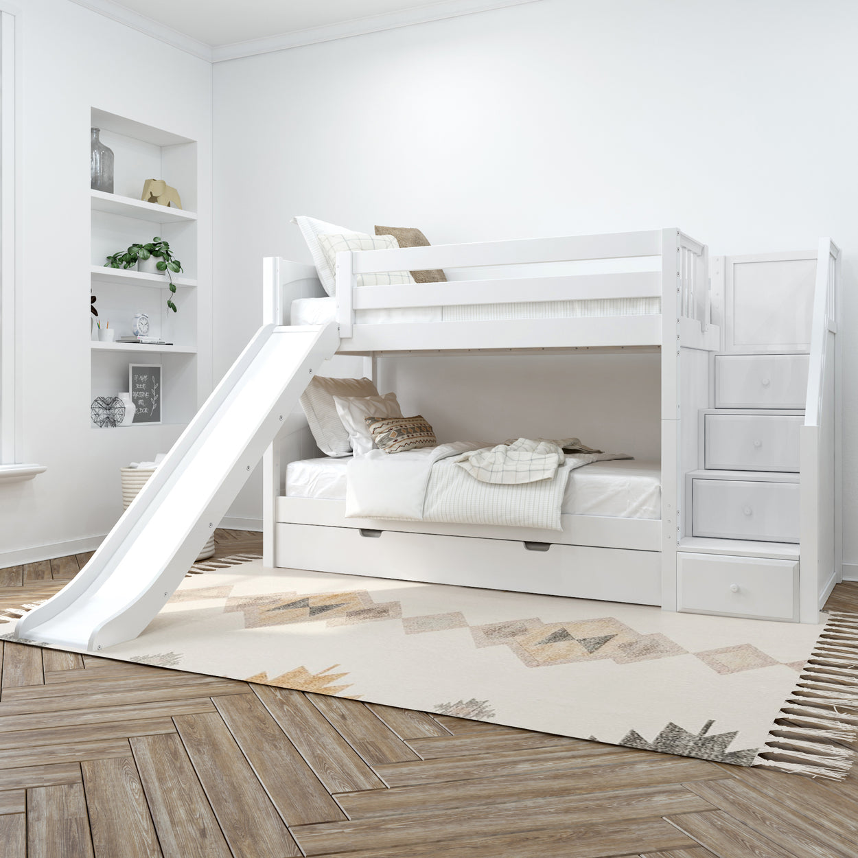 White kids' bunk bed with slide and storage drawers in bright modern bedroom.
