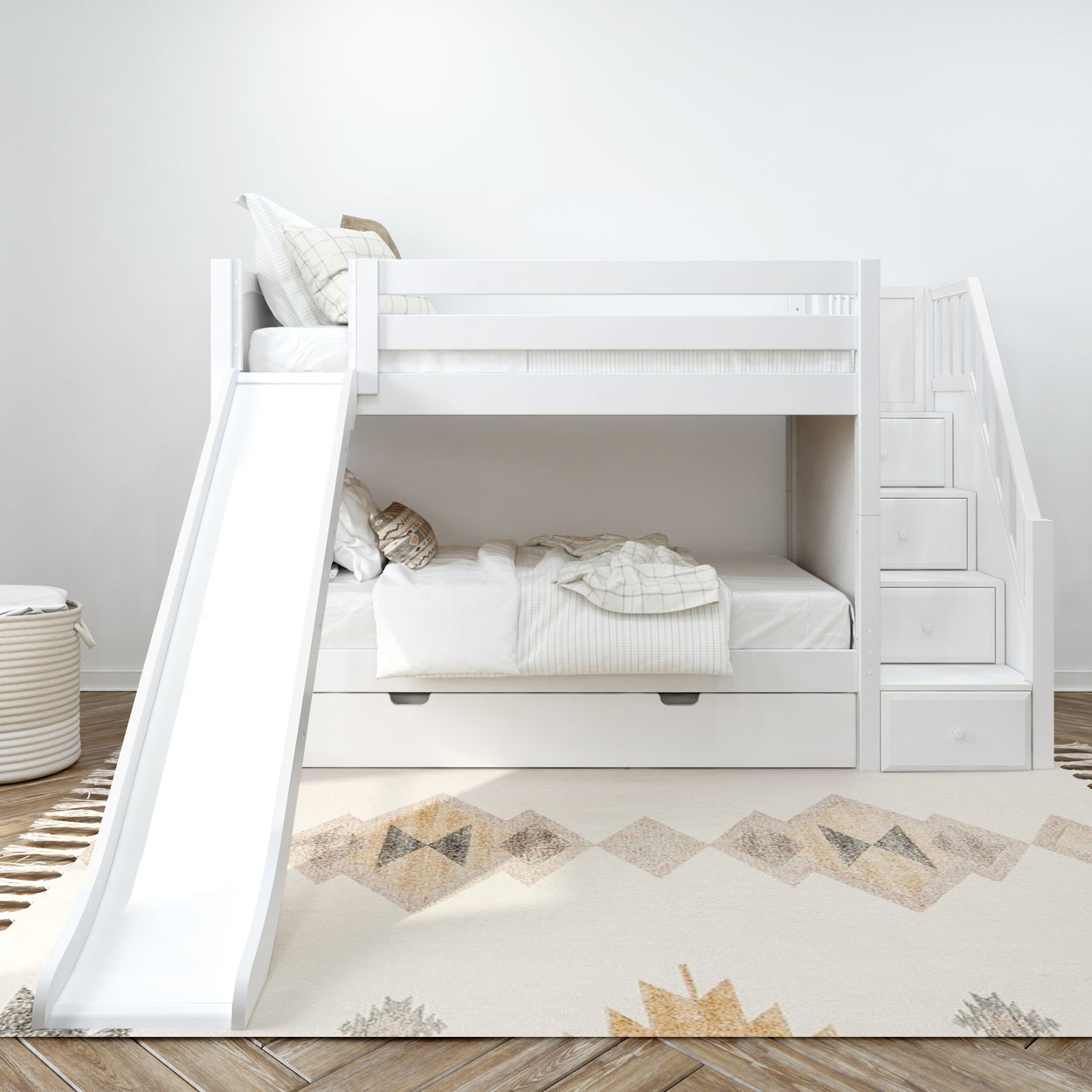 White bunk bed with slide and stairs in a modern kids' bedroom.