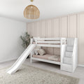 Neutral kids' bedroom interior featuring a white bunk bed with slide and built-in storage stairs, blush bedding, beige board-and-batten accent wall, boho rattan pendant light, patterned area rug and potted plant
