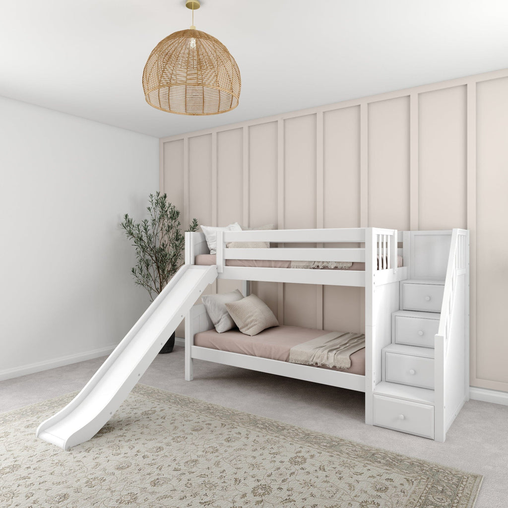 Neutral kids' bedroom interior featuring a white bunk bed with slide and built-in storage stairs, blush bedding, beige board-and-batten accent wall, boho rattan pendant light, patterned area rug and potted plant