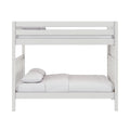 White wooden twin-over-full bunk bed with safety guardrails, slatted headboard and white bedding, modern kids' bedroom furniture
