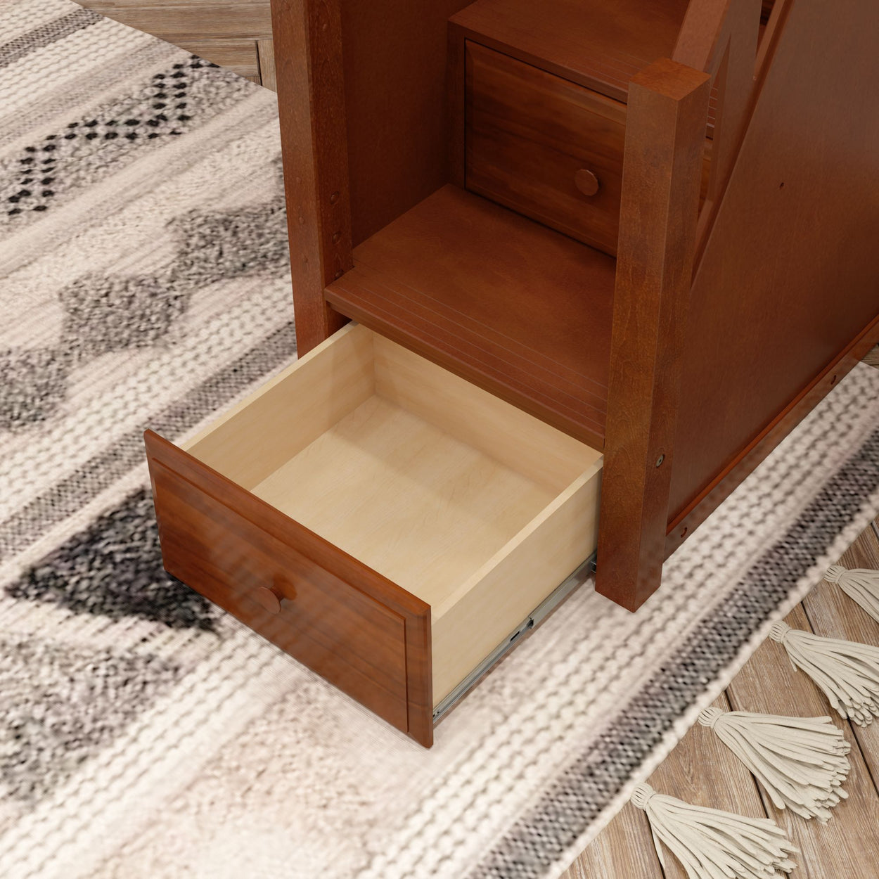 Wooden dresser with open drawer on patterned rug, ideal for home storage solutions.