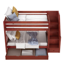 Wooden bunk bed with built-in stairs and under-bed storage drawers, featuring white and striped bedding with decorative pillows.